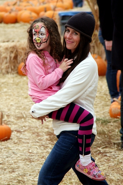 Soleil Moon Frye, White shirt, hat, jeans, tennis shoes